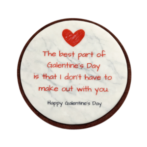 Sample Classy AF cookies saying "The best part of Galentine's Day is that I don't have to make out with you." in red script no a marble background with a red heart on top.
